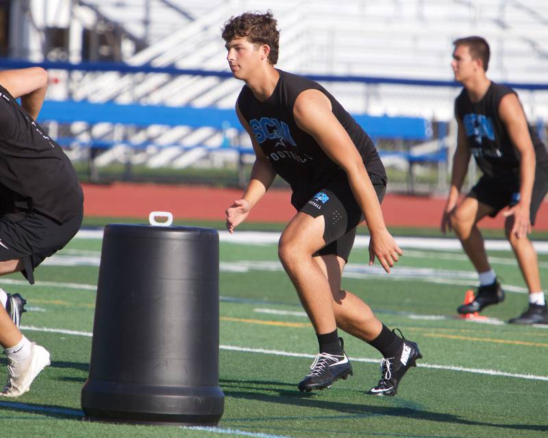 St. Charles North's Matthew Plumb runs drills at the first practice on Monday, Aug.11,2025 in St. Charles.