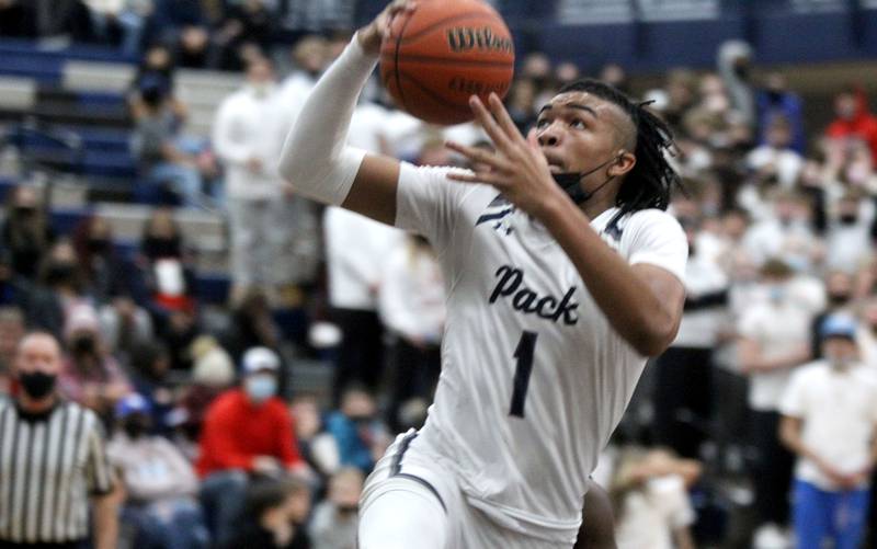 Oswego East’s Patrick Robinson goes up for a basket during a home game against West Aurora on Friday, Jan. 28, 2022.