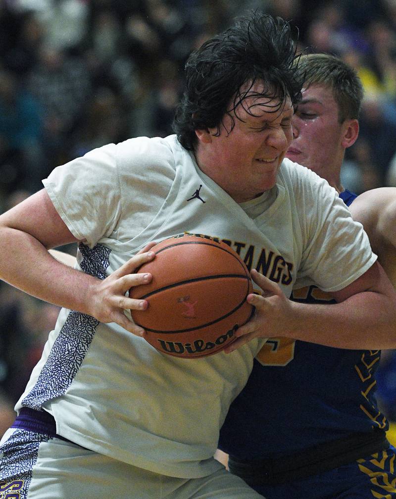 John Starks/jstarks@dailyherald.com
Rolling Meadow’s Mark Nikolich-Wilson runs into Lyon’s Graham Smith in the Jack Tosh boys basketball tournament at York High School in Elmhurst on Friday, December 30, 2022.