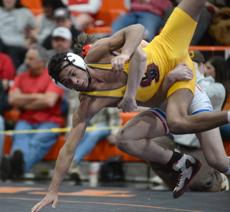 Oregon's Levi Benton throws Lena Winslow's Mauricio Glass to the mat in the 138-pound title match at the 1A Byron Regional on Saturday, Feb. 8, 2025.Benton won the match to advance to the Oregon Sectional.
