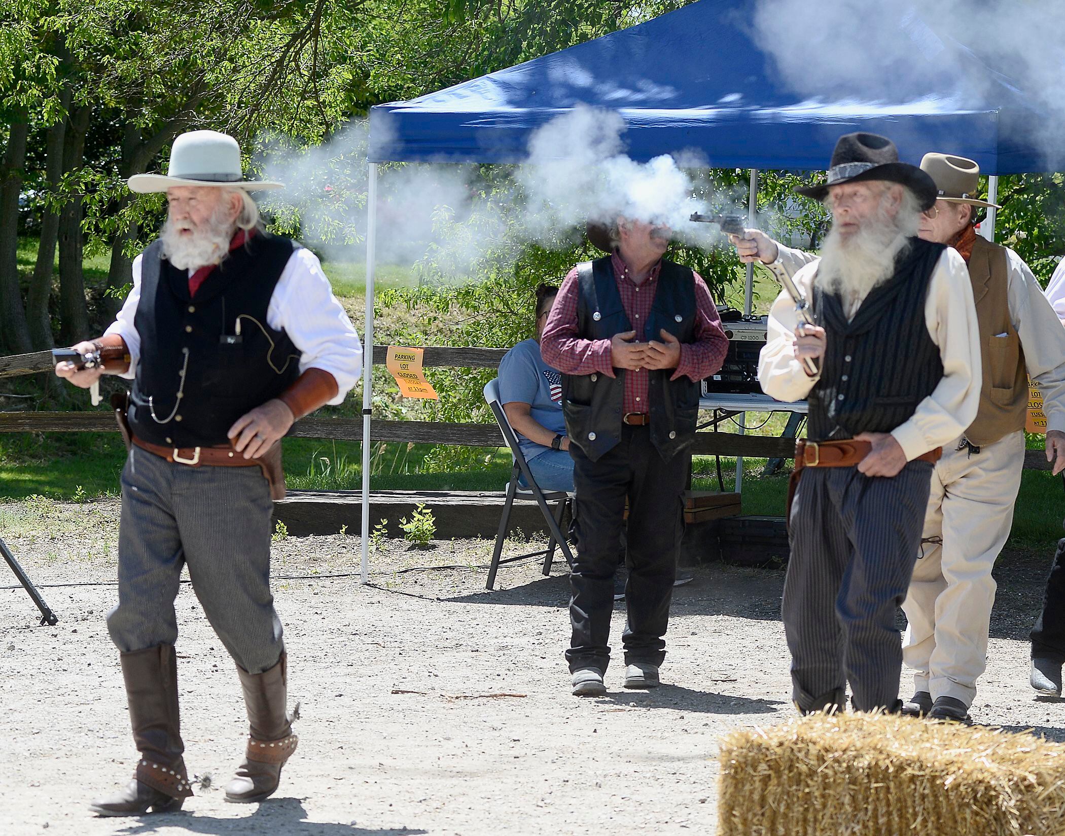 A group of gunslingers fire at Wild Bill Hickok on Saturday, May 27, 2023, during a reenactment at Wild Bill Days in Utica.