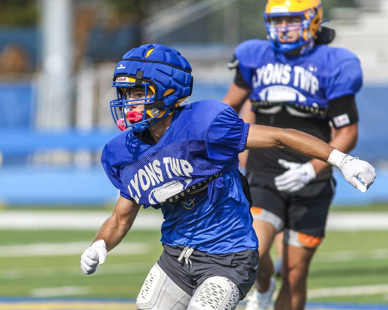 Lou Ratcliffe sniffs out a play and runs to the ball at Lyons football practice, Monday, Aug 18, 2025  in Western Springs.