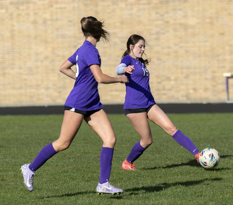 Dixon’s Adysen Johnson takes a shot against North Boone  Tuesday, April 15, 2025.