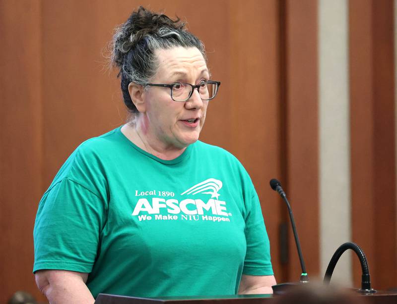 Northern Illinois University employee Krystyna Kamka speaks during the NIU Board of Trustees meeting Thursday, Sept. 21, 2023, in Altgeld Hall on campus in Dekalb. Kamka along with other NIU employees, most represented by the American Federation of State, County and Municipal Employees, spoke out at the meeting seeking a fast resolution to a contract with higher wages.