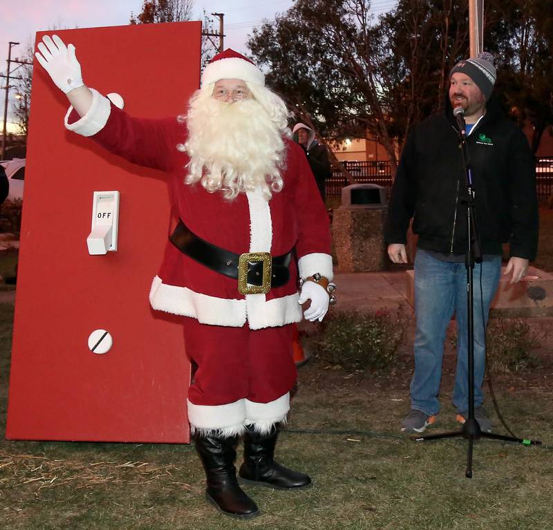 Santa, along with Bill Novicki, executive director of the Sandwich Park District and Sandwich Chamber Board of Directors president, welcomes attendees at A Merry Little Sandwich Christmas on Saturday, Dec. 7, 2024.