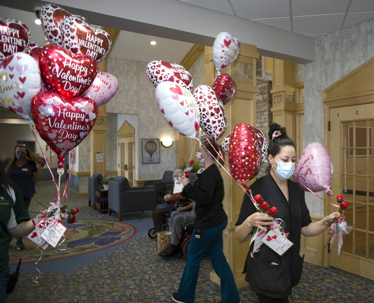 Sonia Jimenez Timbers of Shorewood employee delivers special Valentine’s Day surprises to residents. The gifts were purchased by Families of residents, Timbers’ neighbors and local businesses. The package included a chocolate rose, a heart-shaped balloon, and a personalized card. The $1600 raised from the event was donated to the Alzheimer’s Association.