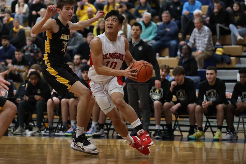 Bolingbrook’s MJ Langit drives along the baseline against Andrew in the Class 4A Oswego Sectional semifinal. Wednesday, Mar. 2, 2022, in Oswego.