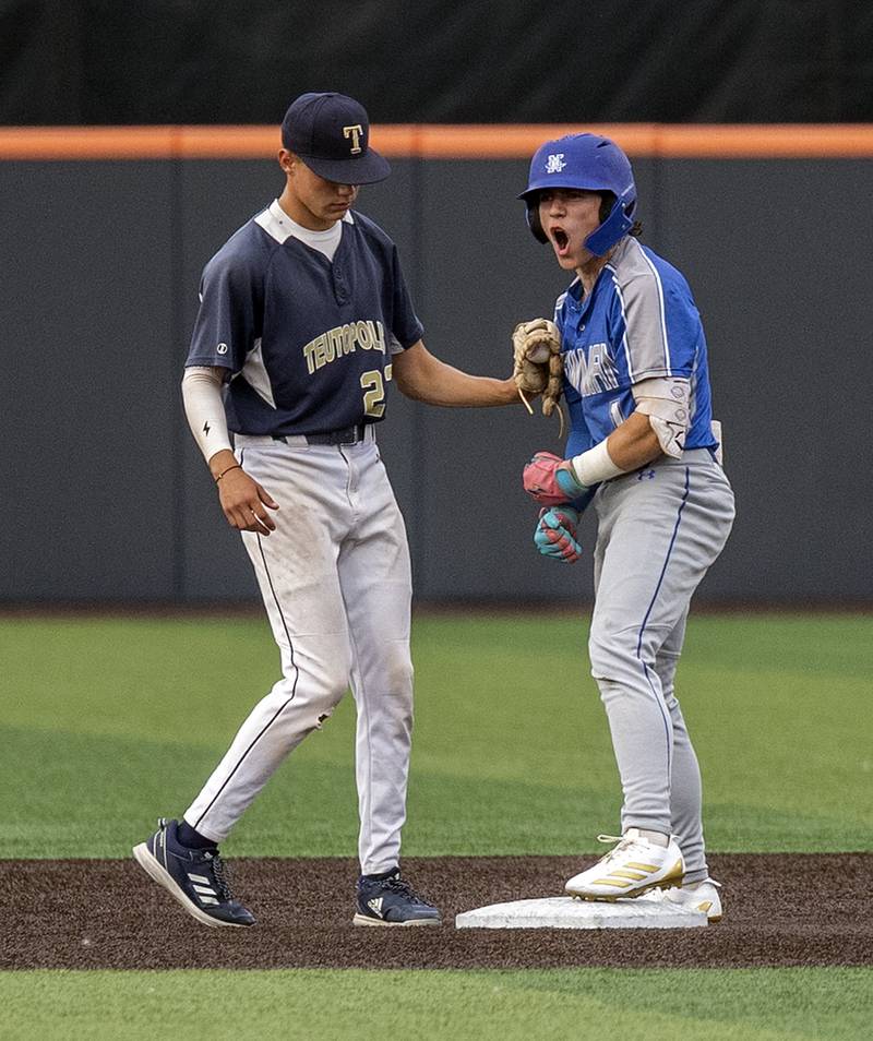 Newman’s Garret Matznick celebrates a lead off double  against Teutopolis Friday, June 6, 2025, during the Class 2A state semifinal at Illinois Field in Champaign.