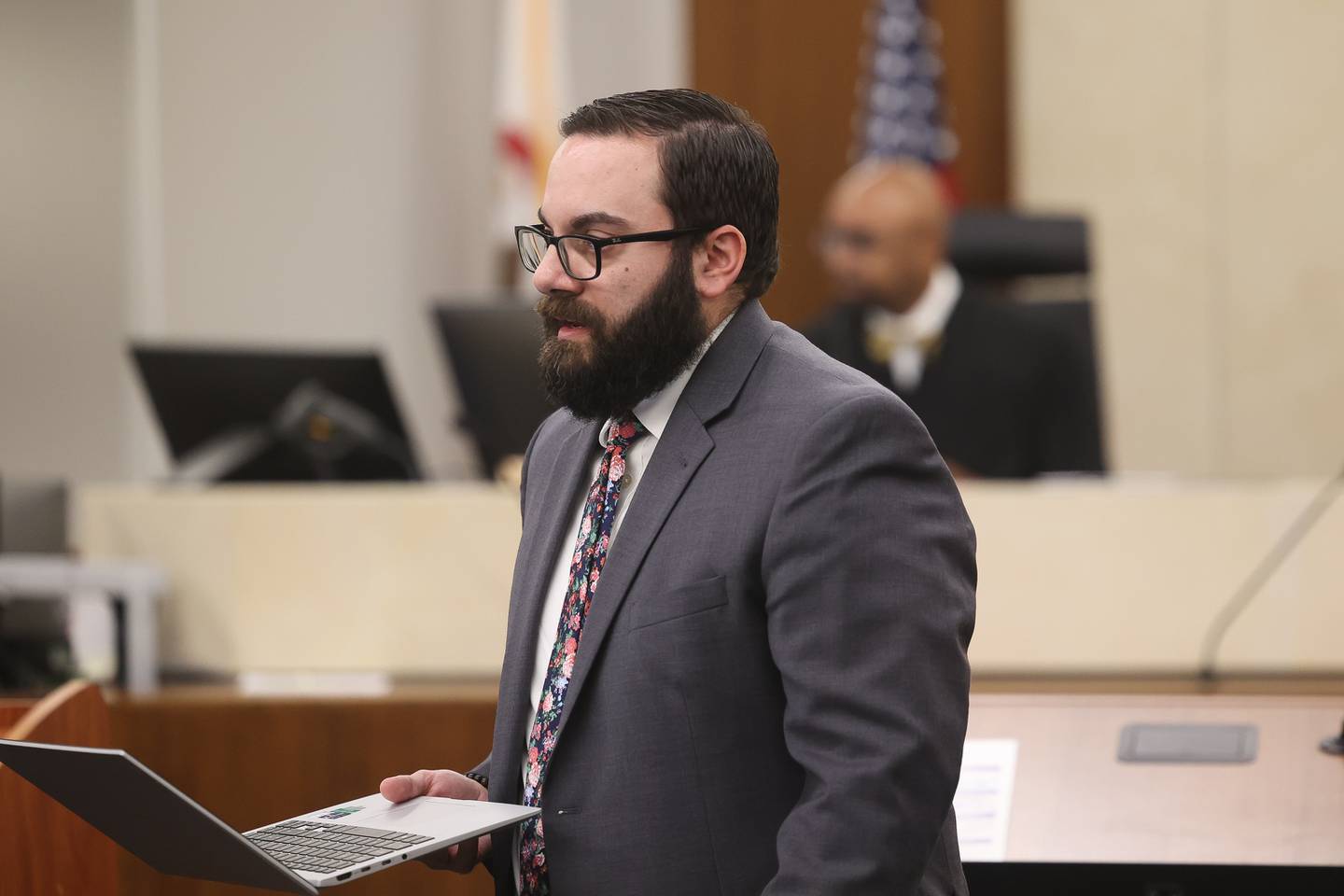 Will County Assistant State’s Attorney Nick Plattos walks back to his desk at the Jon Hansen arraignment at the Will County Courthouse on Thursday June 27, 2024 in Joliet. Hansen was arrested in May in connection with the Joliet murder spree that left 8 people dead in January.