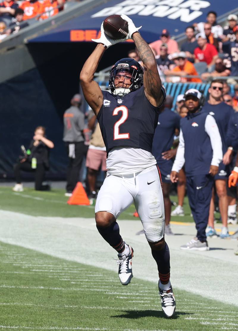 Chicago Bears wide receiver DJ Moore makes a catch on the Denver Bronco sideline during their game Sunday, Oct. 1, 2023, at Soldier Field in Chicago.