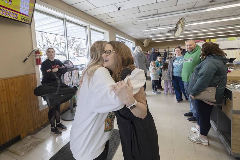 Patty Oliver greets a visitor Saturday, April 4, 2026, at a store closing celebration for family and employees of Oliver’s Corner Market in Dixon.