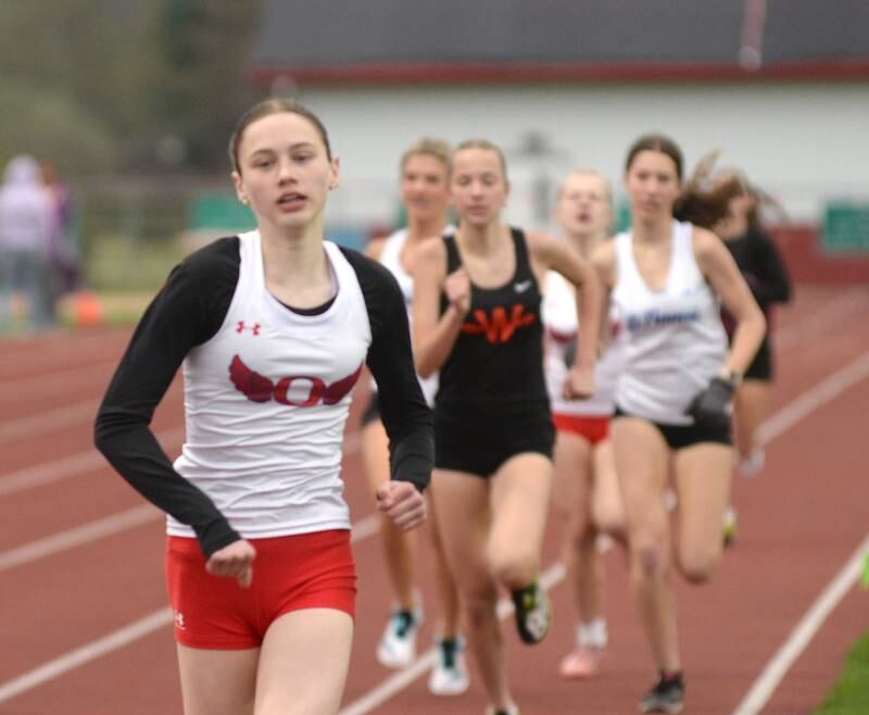 Oregon's Lorelai Dannhorn (left) runs the 800 meters at the Landers-Loomis Invitational track meet on Friday, April 25, 2025 held at Oregon High School. She finished third.