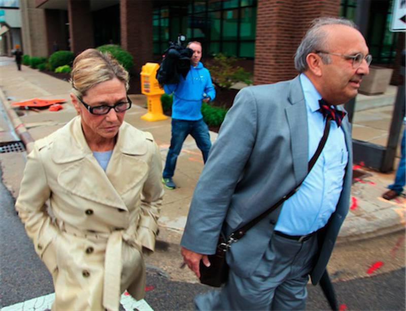 Rita Crundwell, former comptroller for Dixon, leaves federal court Monday in Rockford with her attorney Paul Gaziano after pleading not guilty at her arraignment to charges that accuse her of stealing tens of millions of dollars from the community.Prosecutors contend that Crundwell had been transferring Dixon’s money to a secret account since 1990 and using the money to create one of the nation’s leading horse-breeding operations and to buy luxury homes, cars and jewelry.