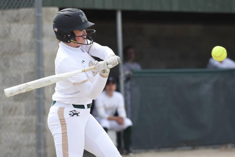 Bishop McNamara's Regan Kaner swings at a pitch during a home game against St. Laurence Saturday, April 11, 2026.