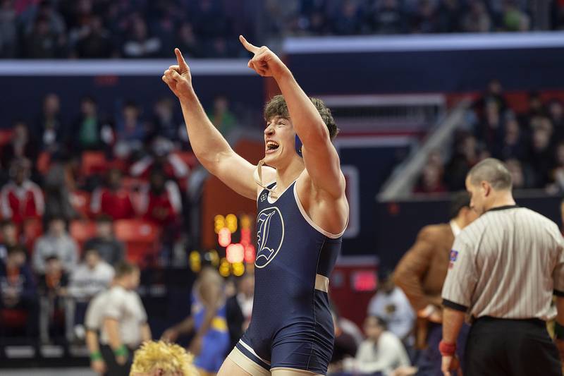 Lemont’s Judah Heeg celebrates after beating Crystal Lake Central’s Cayden Parks in the 190 pound weight class of the 2A state individual wrestling finals Saturday, Feb. 22, 2025, at State Farm Center in Champaign.
