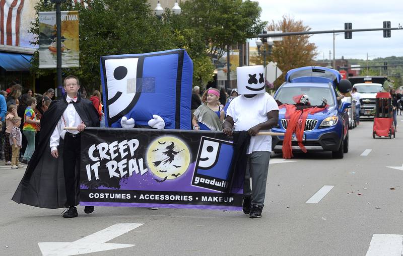 Goodwill marches along La Salle Street in Ottawa during the Scarecrow parade Sunday, Sept. 25, 2022.