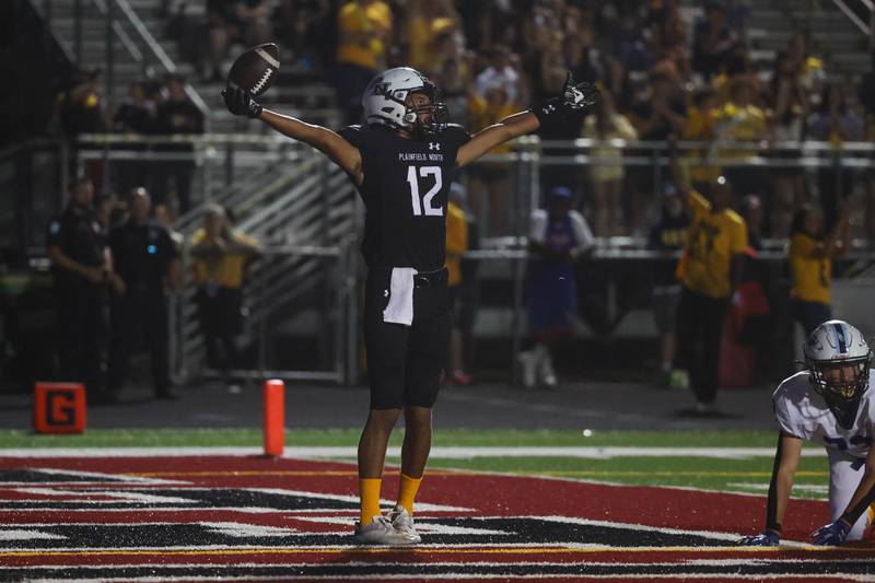 Plainfield North’s Sean Schlanser celebrates a touchdown catch against Plainfield South. Thursday, Sept. 15, 2022, in Plainfield.