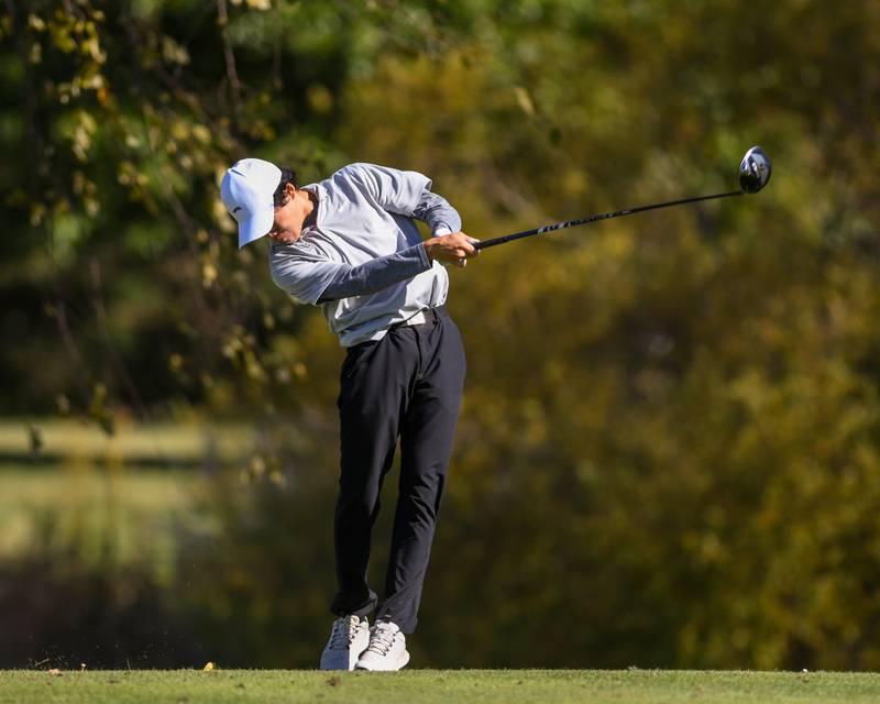Oswego East's Logan Hong tees off on Monday Oct. 7, 2024, during the 3A sectional match held at Blackberry Oaks Golf Course in Bristol.