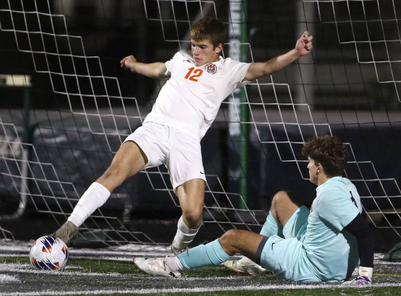 Crystal Lake Central's Justin Moore tries to keep the ball out of the goal in front of his teammate, goalkeeper Anthony Bellino, during the IHSA Boys Soccer 2A Grayslake Central Sectional semifinal match on Tuesday, Oct. 29, 2024, at Grayslake Central High School. It was ruled a goal and credited to Prairie Ridge's Seth Matson.
