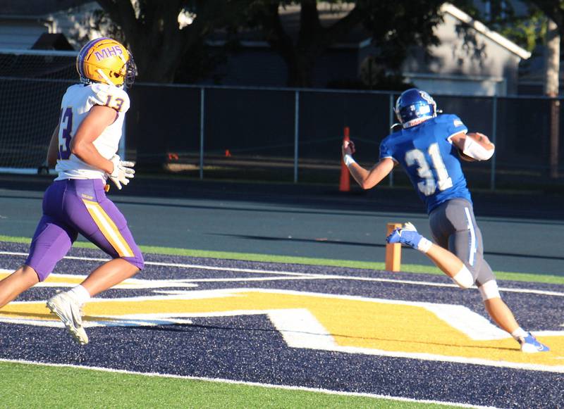 Newman’s Cody McBride runs it in for a touchdown Saturday, Sept. 7, 2024, against Mendota.