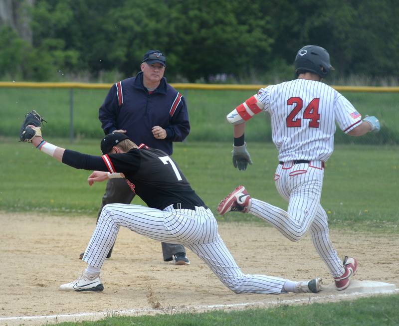 Forreston's Mickey Probst beats out the throw as Fulton's  Jacob Huisenga makes the catch at the 1A Amboy Regional on Saturday, May 24, 2025.