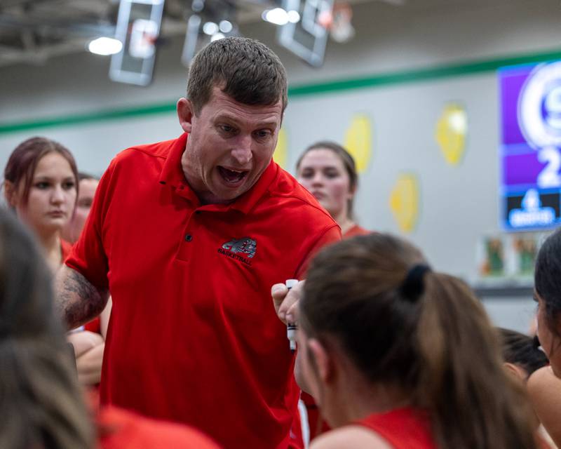 Streator Head Coach, Eric Gwaltney talks to team during time out on Monday, November 17, 2025 at Seneca High School in Seneca.