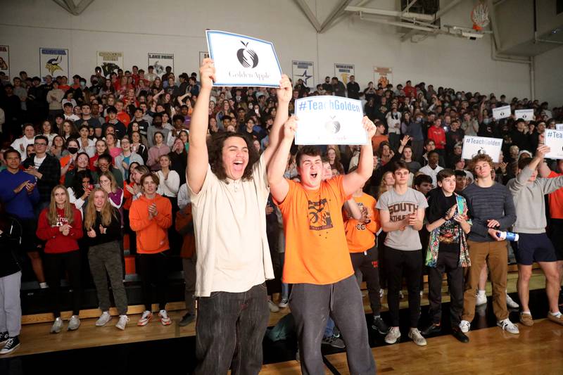 Wheaton Warrenville South students cheer on teacher Philip Culcasi as he was surprised with an assembly to announce his Golden Apple Award for Excellence in Teaching on Friday, May 6, 2022.