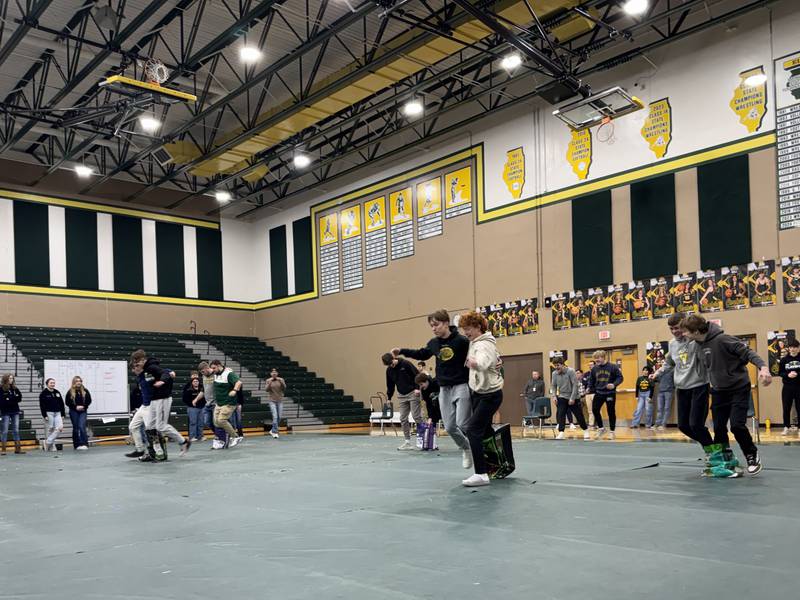 Coal City students navigate the three-legged race during the FFA Week kickoff event on Monday, Feb. 23, 2026.