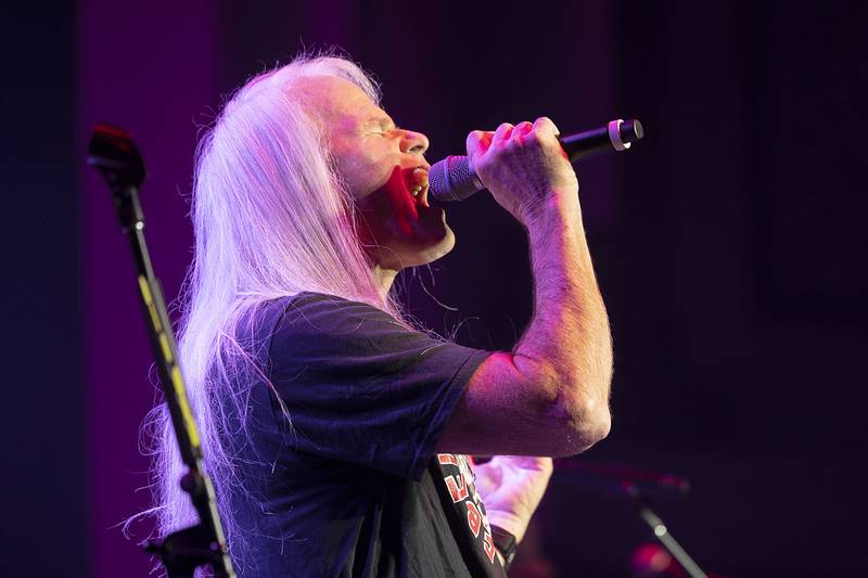 Darren Walker, lead vocalist for Head East gets the crowd going Saturday, April 22, 2023 at the Dixon Historic Theatre. The Illinois-based band has been around for 50 years and proved it hasn't missed a beat by “rasing a little hell” with the large, excited crowd.