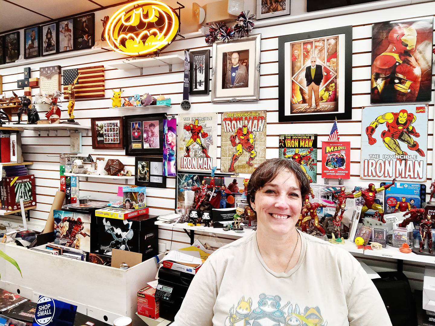 Kerri Smith, owner of The Paper Escape in downtown Dixon, sells gaming cards, board games, comic books and paperback fantasy books.