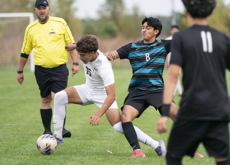 Harvard's Brandon Estrada and Woodstock North's Alberto Carbajal collide during the Kishwaukee River Conference Tournament Championship game on Monday, October 6, 2025 at Woodstock North High School. Ryan Rayburn for Shaw Local