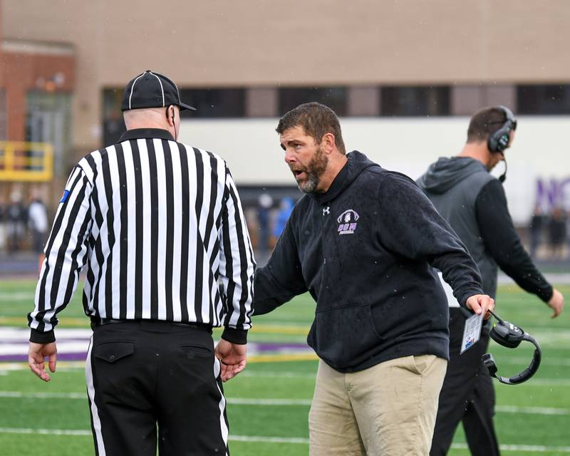 Downers Grove North's head coach Joe Horeni voices his thoughts after multiple penalties that were called and not called throughout the game during the second week of the class 7A game on Saturday Nov. 9, 2024, while taking on Fenwick High School held at Downers Grove North High School.