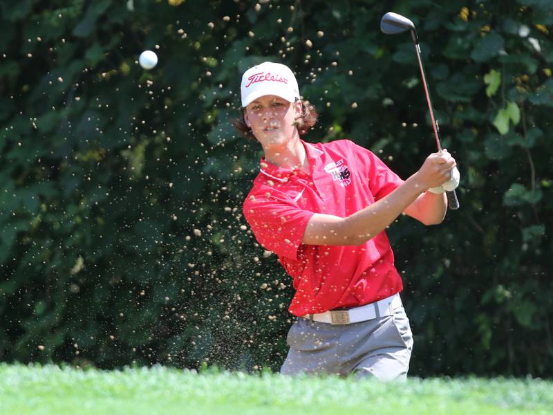 Huntley’s Nathan Elm hits out of the sand on the second hole during the Mark Rolfing Cup Monday, Aug. 21, 2023, at the Kishwaukee Country Club in DeKalb.