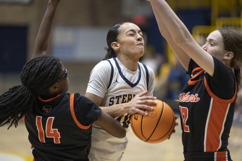 Sterling’s Nia Harris works below the basket against United Township Thursday, Dec. 18, 2025.