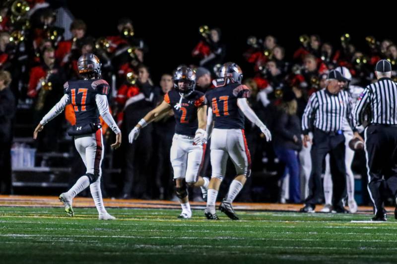 Minooka's Joey Partridge (2) celebrates a touchdown with teammates during football game between Plainfield North at Minooka.   Oct 6, 2023.