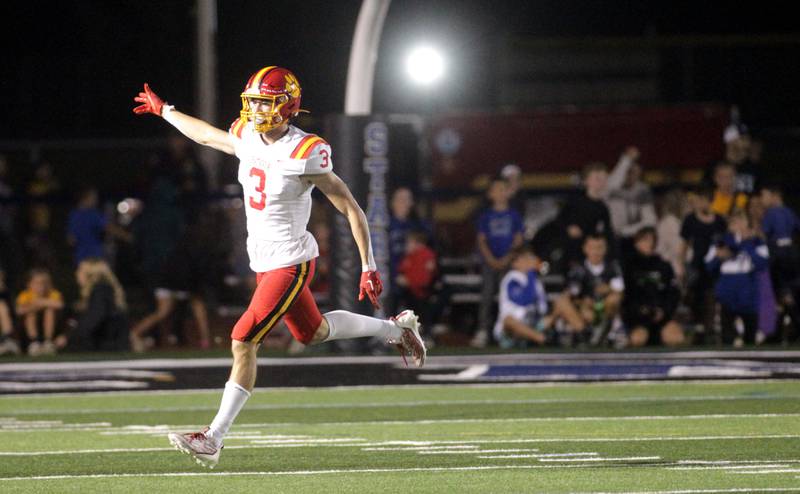 Batavia’s Kyle Porter celebrates a touchdown during a game at St. Charles North on Friday, Sept. 15, 2023.