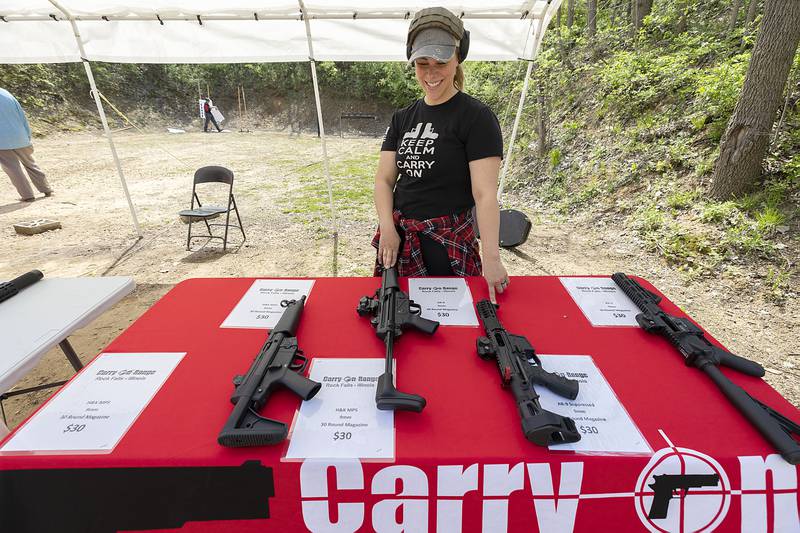 Lindsey Hagerman of Carry On Range in Rock Falls talks about a few of the guns visitors can try at the Tri-County Gun Club’s open house Saturday, May 6, 2023.