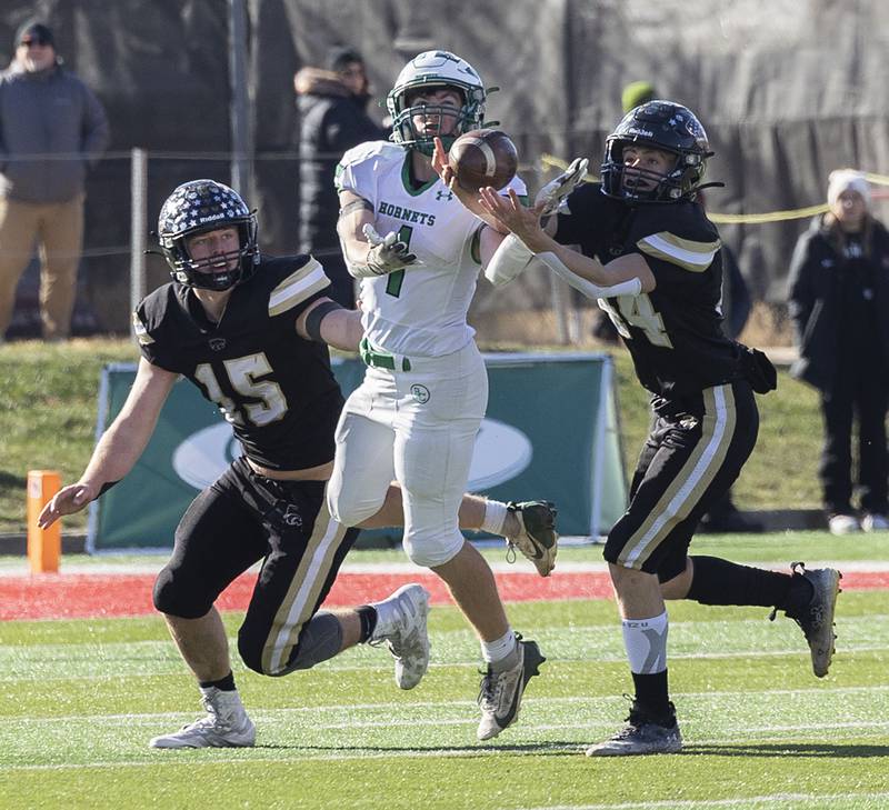 Lena-Winslow’s Ashton Gerber breaks up a pass intended for Brown County's Beau Little Friday, Nov. 28, 2025, in the Class 1A football finals at Hancock Stadium at ISU.