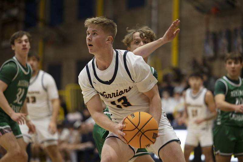 Sterling’s Will Ports goes to the hoop against Alleman Friday, Dec. 20, 2024, at Sterling High School.