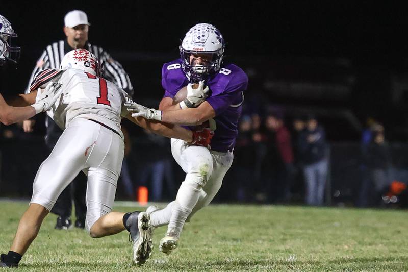 Wilmington’s Kyle Farrell pushes his way past a Stillman Valley defender in the first round of the playoffs on Saturday, Nov. 2, 2024 in Wilmington.