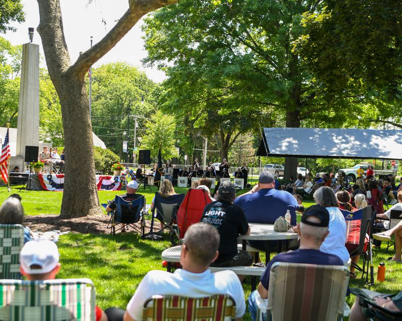 Community members listen to the Yorkville Big Band during the Memorial Day event on Monday May 25, 2026, held at Town Square Park in Yorkville.