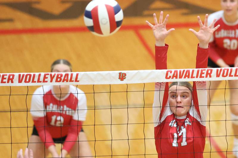 L-P's McKenzie Krzyaniak misses a block against Washington during the Class 3A Sectional final game on Thursday, Nov. 6, 2025 in Sellett Gymnasium at L-P High School.