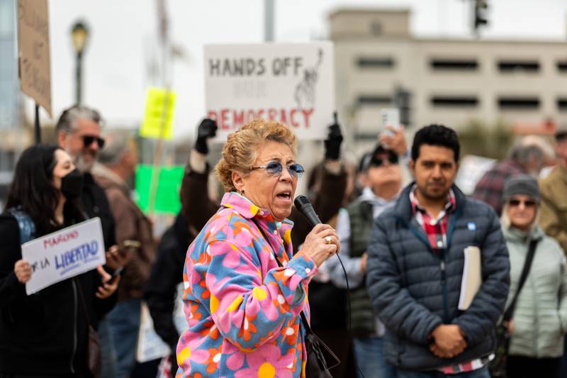 Romeoville resident Nitza Anaya addresses the crowd at the Hands Off protest in Downtown Joliet on April 5, 2025.