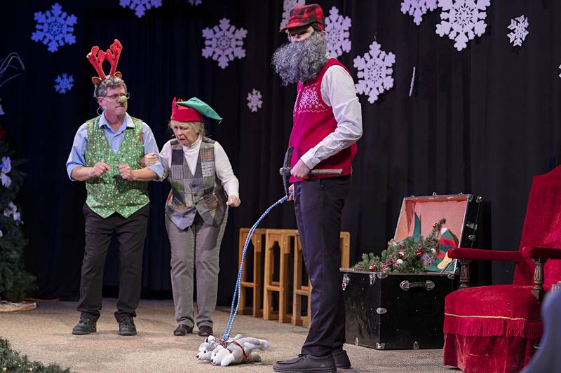 Morgan McConnell (left), Connie Augsburger and Zander VandeSand act out a parody scene of Rudolph the Red-Nosed Reindeer for Pinecrest Grove Theater’s “Every Christmas Story Ever Told (And Then Some!)” on Wednesday, Dec. 7, 2022. Performances are 7 p.m. Friday and Saturday and 2 p.m. Sunday.