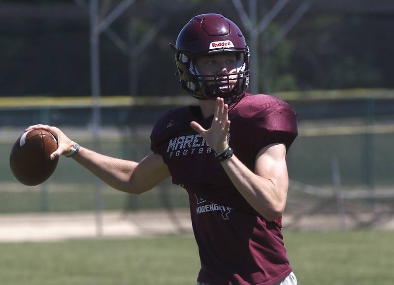 Marengo’s Josh Holst throws the ball during summer football practice Monday, June 27, 2022, at Marengo Community High School in Marengo.