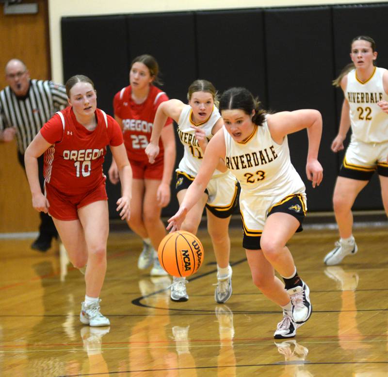Riverdale's Jillian Murray (23) leads the fast break against Oregon at the 2A Erie-Prophetstown Regional on Thursday, Feb. 20, 2025.