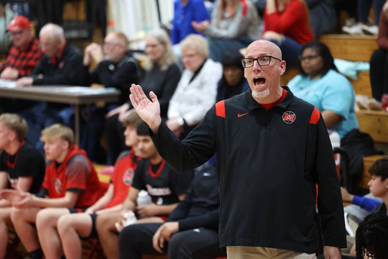 Momence head coach Kevin Ecker communicates to his players during Momence's 64-43 loss to St. Anne in the River Valley Conference semifinals on Tuesday, Feb. 10, 2026.