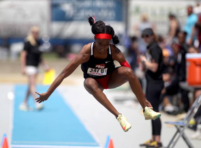 Huntley’s Alexandria Johnson competes in the 3A triple jump during the IHSA State Track and Field Finals at Eastern Illinois University in Charleston on Saturday, May 20, 2023.