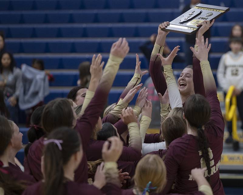 Morris celebrates their regional win over Sterling Thursday, Oct. 30, 2025, in the Class 3A volleyball regional.