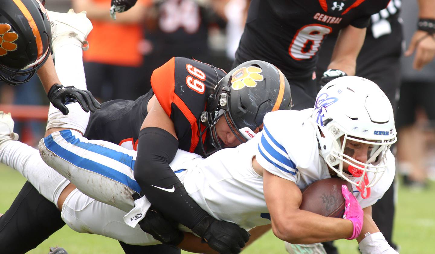 Crystal Lake Central’s Anthony Morales brings down Burlington Central’s Lucas Kerr in varsity football at Crystal Lake Saturday.